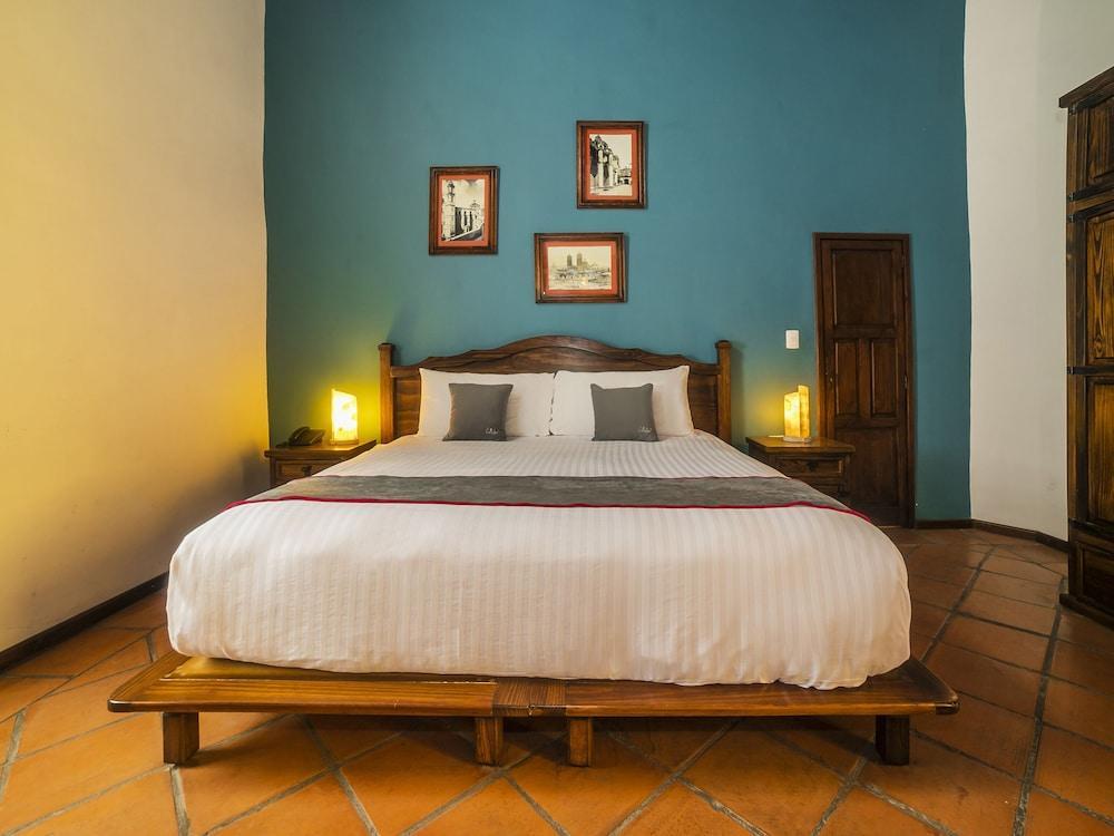 Collection O Al Otro Lado Del Rio, Puebla Hotel Exterior foto A bedroom at the hotel
